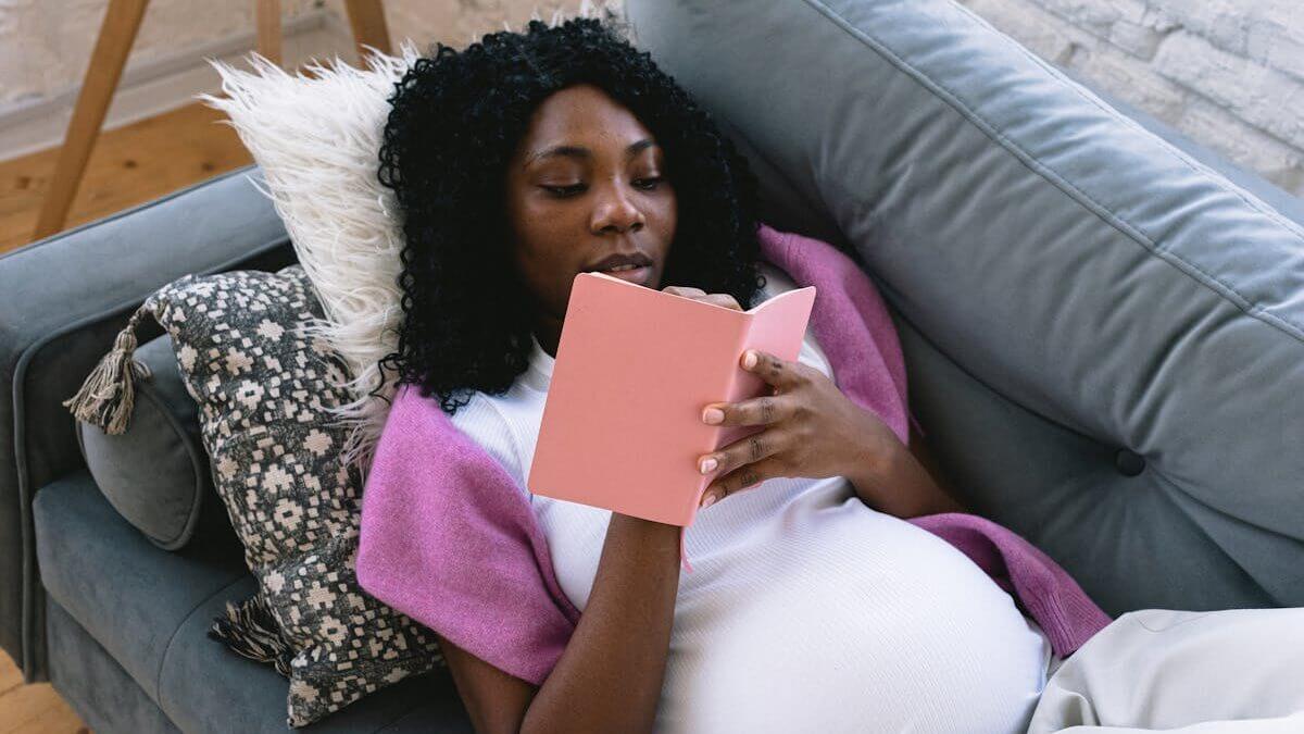 Black pregnant woman — Pass Go! Therapy and Coaching