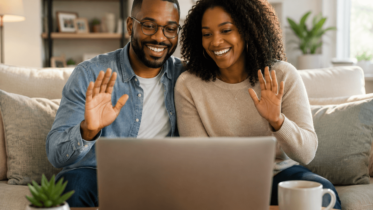 Professional African American couple sitting on couch for virtual couples therapy session